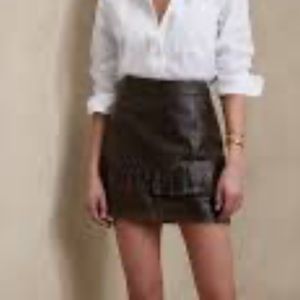 Beautiful distressed leather skirt with fringe detailing!! size 4